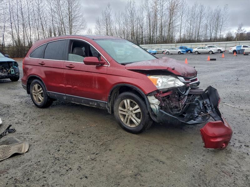 Photo 4 from auction – 2011 HONDA CR-V EXL with VIN JHLRE4H75BC021979