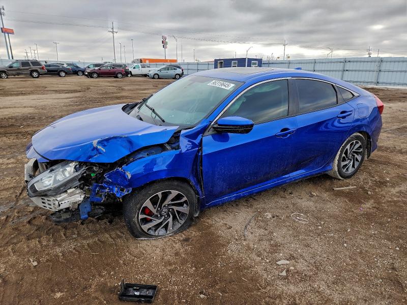 HONDA CIVIC EX 2017 with VIN 2HGFC2F73HH557477 - Photo from auction