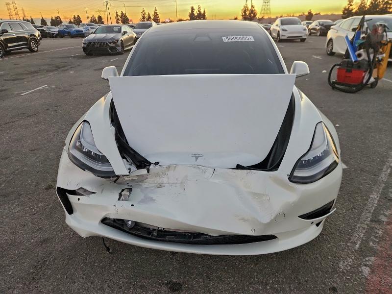 Photo 5 from auction – 2019 TESLA MODEL 3 with VIN 5YJ3E1EBXKF388499
