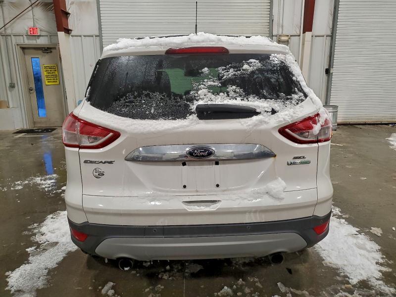 Photo 6 from auction – 2013 FORD ESCAPE with VIN 1FMCU0HX7DUB39023