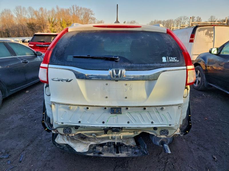 Photo 6 from auction – 2016 HONDA CR-V with VIN 5J6RM3H76GL000196
