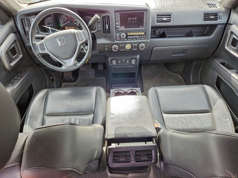 Photo 8 from auction – 2014 HONDA RIDGELINE with VIN 5FPYK1F60EB006198