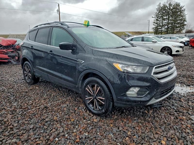 Photo 4 from auction – 2018 FORD ESCAPE SE with VIN 1FMCU9GD8JUD30960