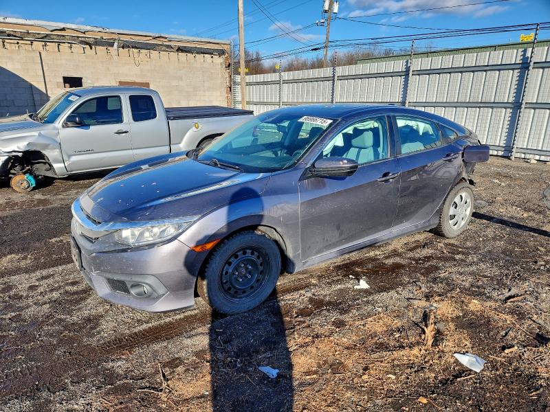 HONDA CIVIC EX 2017 with VIN 19XFC1F47HE209286 - Photo from auction