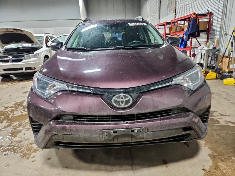 Photo 5 from auction – 2018 TOYOTA RAV4 LE with VIN 2T3BFREV7JW779684