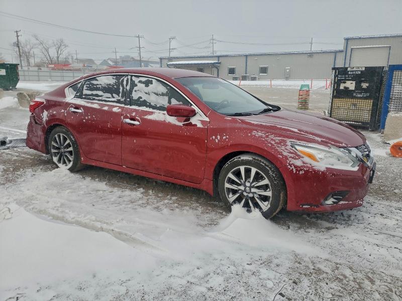 Photo 4 from auction – 2016 NISSAN ALTIMA 2.5 with VIN 1N4AL3AP4GC236500