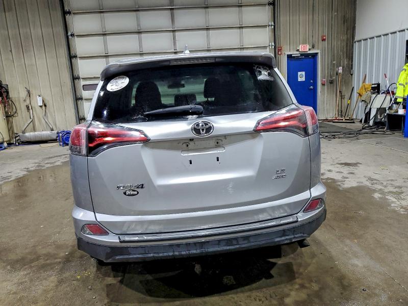 Photo 6 from auction – 2018 TOYOTA RAV4 LE with VIN 2T3BFREV4JW724237