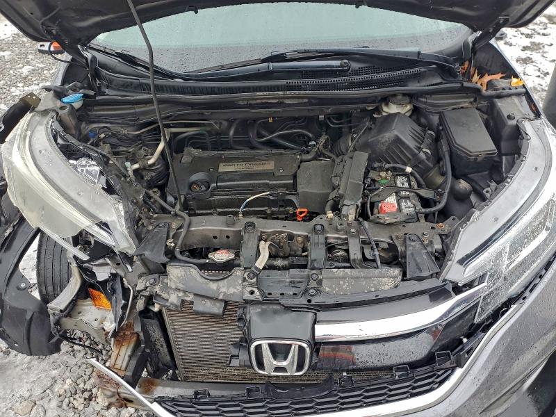 Photo 12 from auction – 2015 HONDA CR-V LX with VIN 5J6RM4H33FL023940