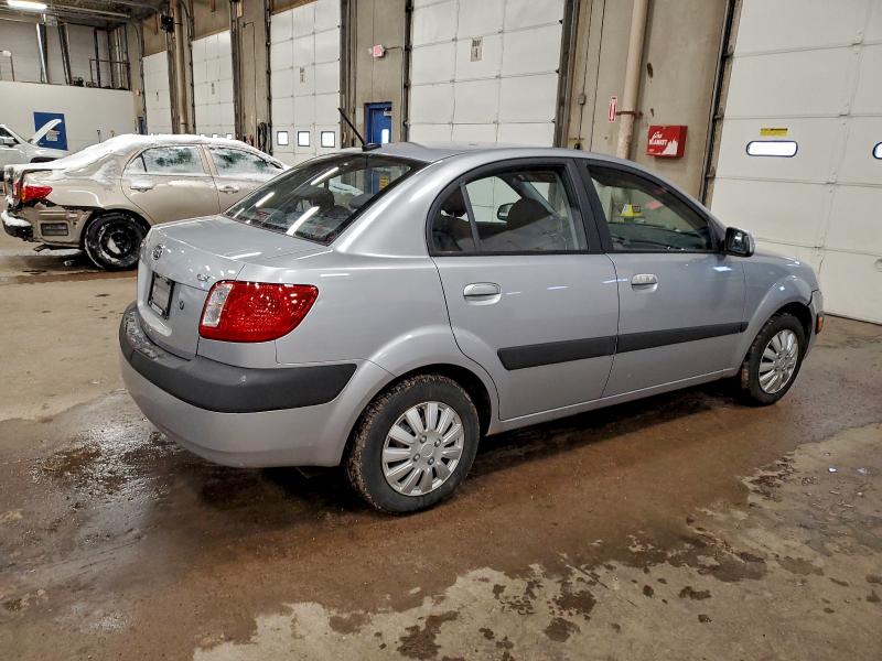 Photo 3 from auction – 2009 KIA RIO BASE with VIN KNADE223196495550