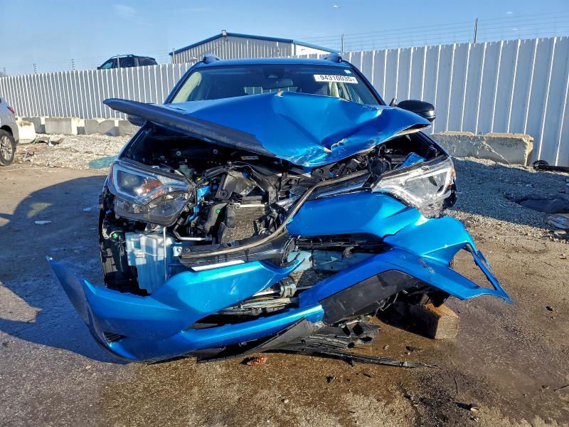 Photo 5 from auction – 2017 TOYOTA RAV4 LE with VIN JTMZFREV1HJ710187