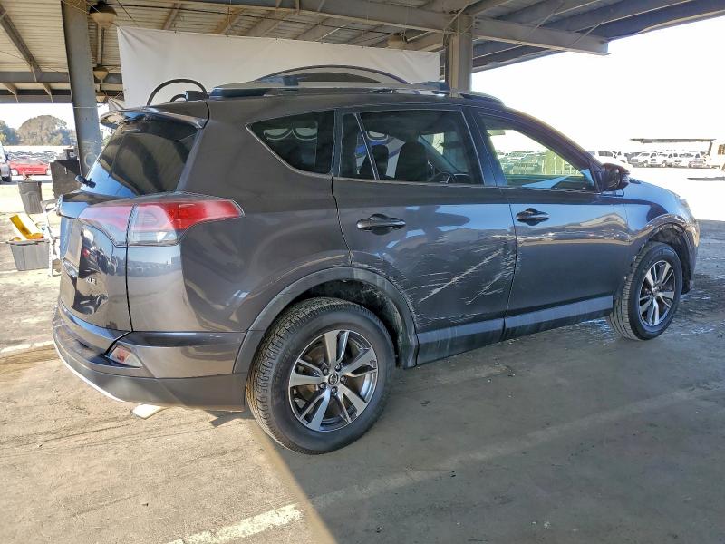 Photo 3 from auction – 2016 TOYOTA RAV4 XLE with VIN JTMWFREV6GD084037