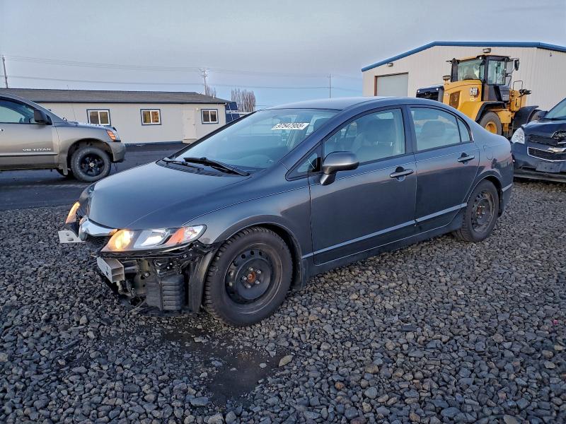 HONDA CIVIC LX 2011 with VIN 19XFA1F56BE008775 - Photo from auction