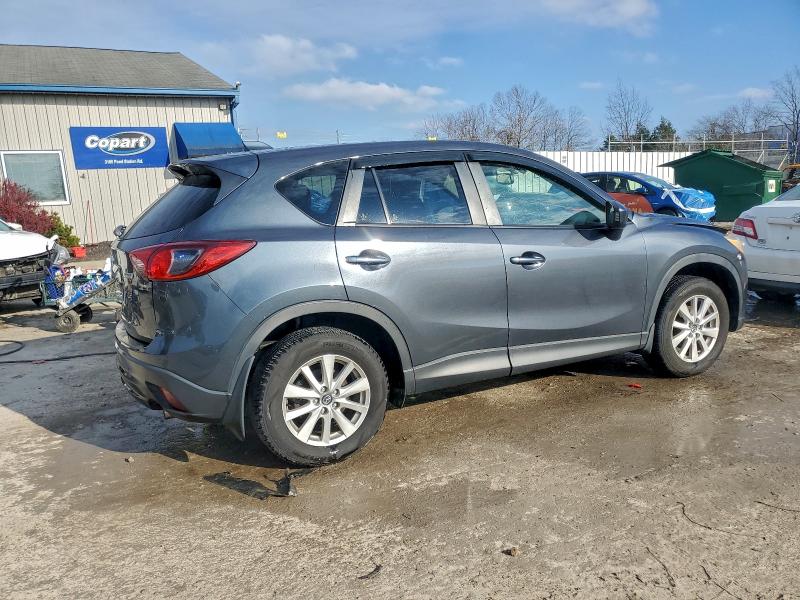 Photo 3 from auction – 2013 MAZDA CX-5 TOURI with VIN JM3KE4CE9D0111863