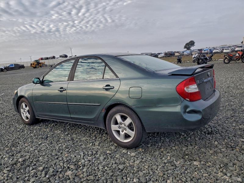 Photo 2 from auction – 2002 TOYOTA CAMRY LE with VIN JTDBE32K620110502