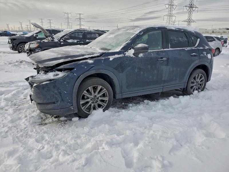 MAZDA CX-5 GRAND 2021 with VIN JM3KFBDMXM1371271 - Photo from auction