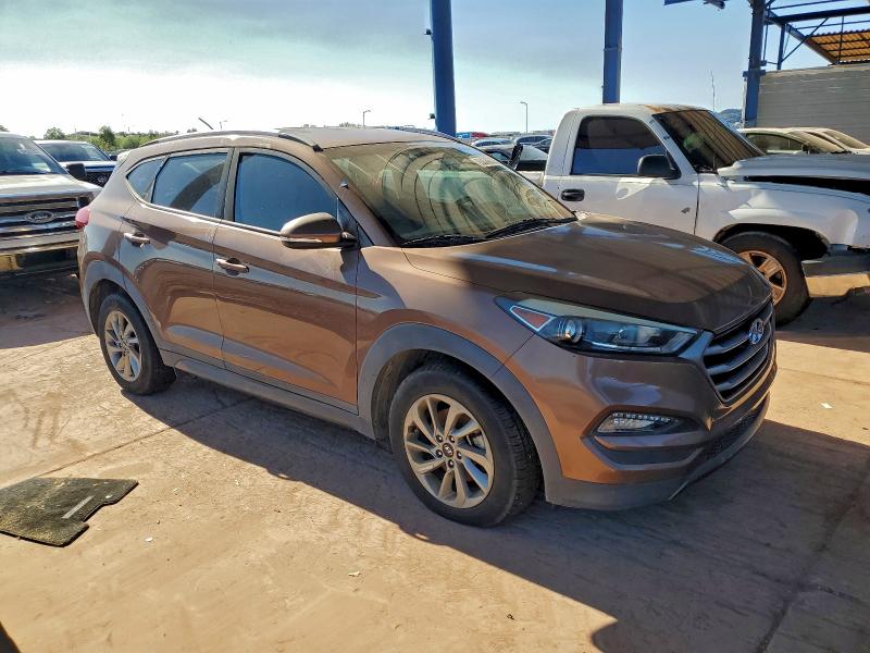 Photo 4 from auction – 2016 HYUNDAI TUCSON LIM with VIN KM8J33A20GU185954