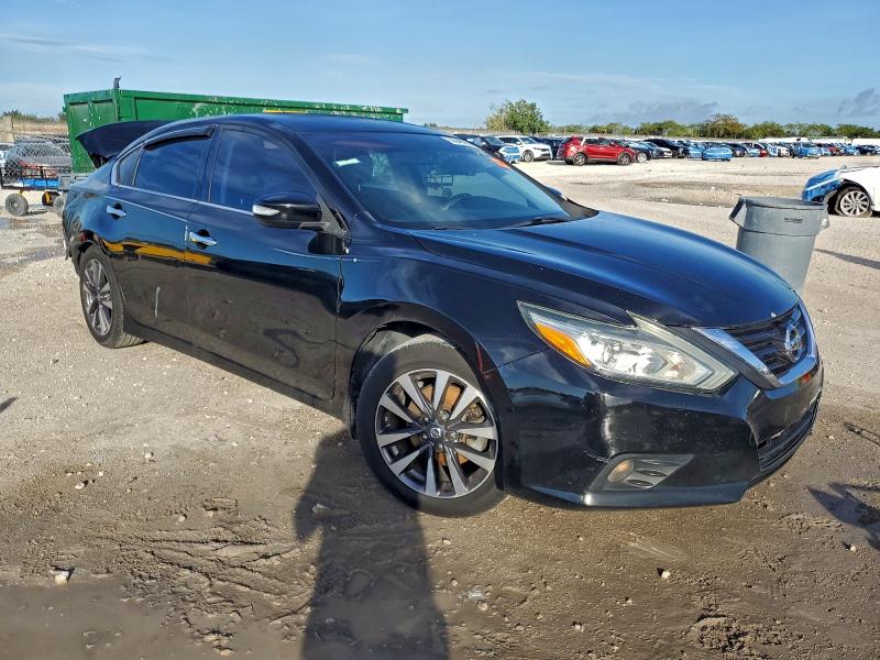 Photo 4 from auction – 2016 NISSAN ALTIMA 2.5 with VIN 1N4AL3AP0GC156496
