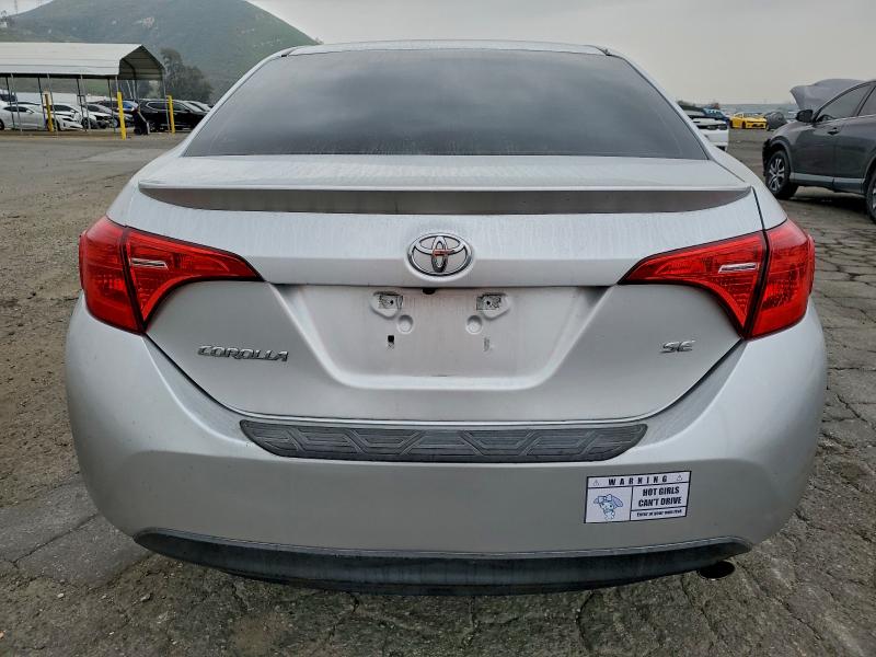 Photo 6 from auction – 2018 TOYOTA COROLLA L with VIN 5YFBURHEXJP765824