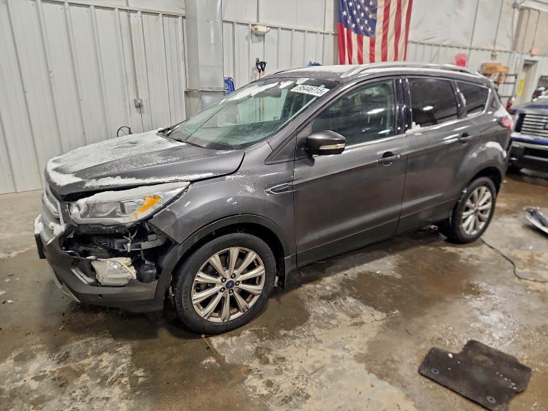 FORD ESCAPE TIT 2017 with VIN 1FMCU9J90HUC91103 - Photo from auction