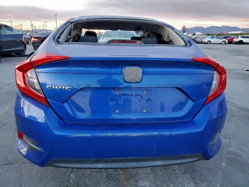 Photo 6 from auction – 2016 HONDA CIVIC LX with VIN 19XFC2F55GE203872