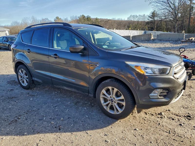 Photo 4 from auction – 2018 FORD ESCAPE SE with VIN 1FMCU9GD7JUC24614