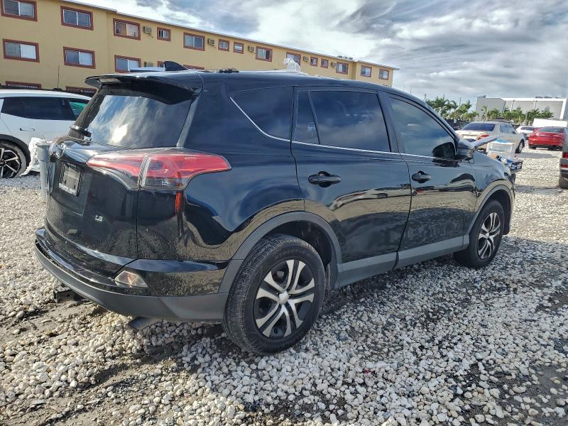 Photo 3 from auction – 2016 TOYOTA RAV4 with VIN 2T3ZFREV8GW256598