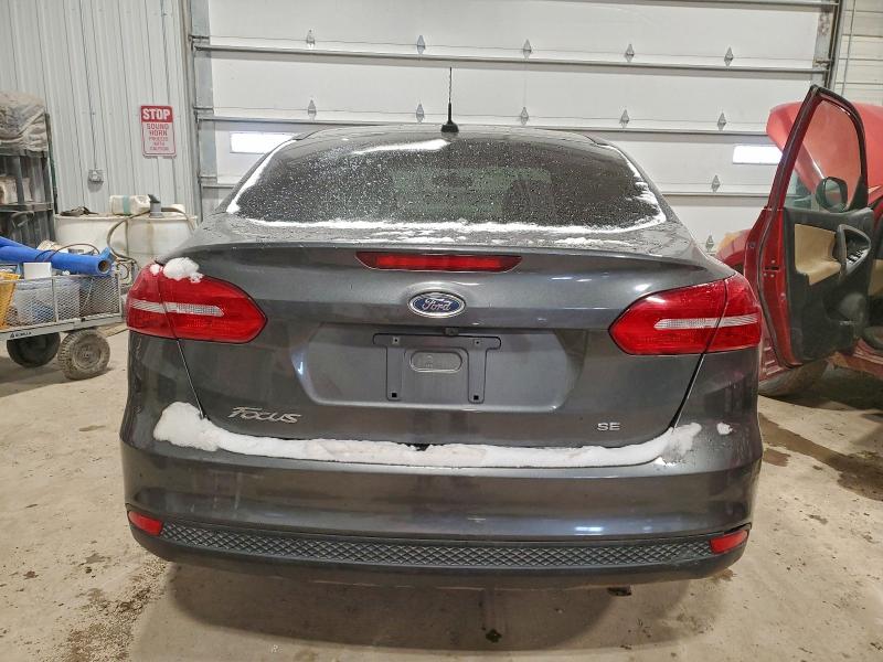 Фото 6 с аукциона – 2017 FORD FOCUS SE с VIN 1FADP3F27HL227497