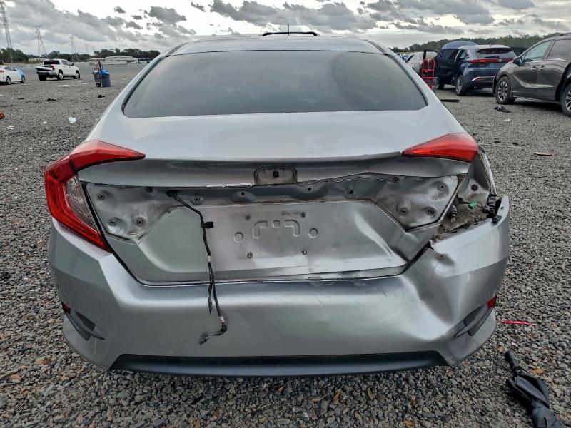 Photo 6 from auction – 2016 HONDA CIVIC LX with VIN 19XFC2F51GE015608