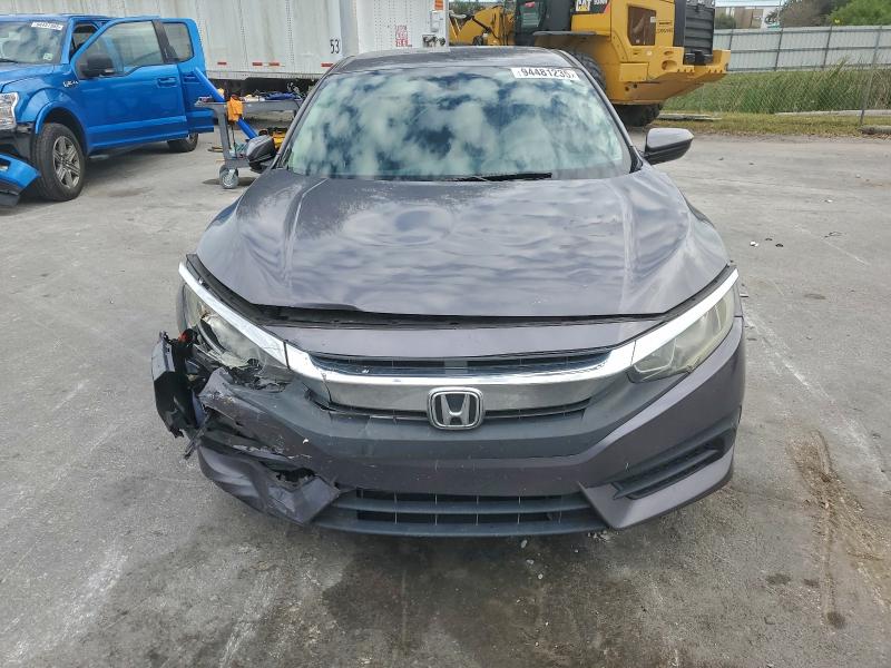Photo 5 from auction – 2018 HONDA CIVIC with VIN 2HGFC2F58JH580399
