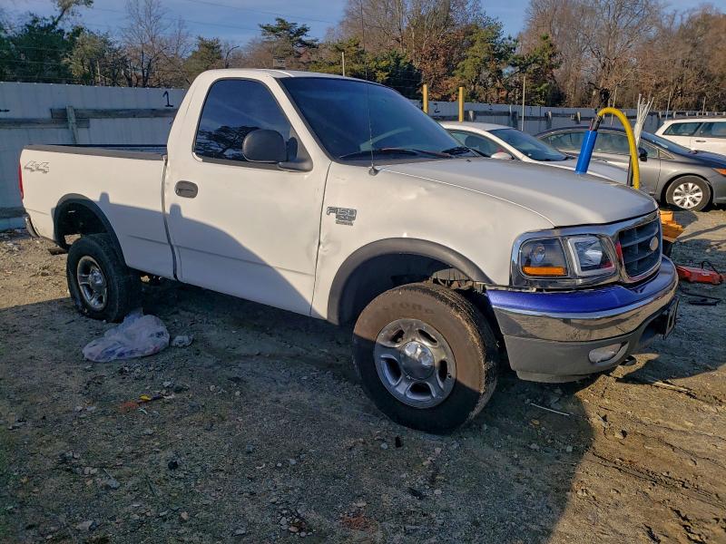 Photo 4 from auction – 2002 FORD F150 with VIN 1FTRF18LX2NB05774