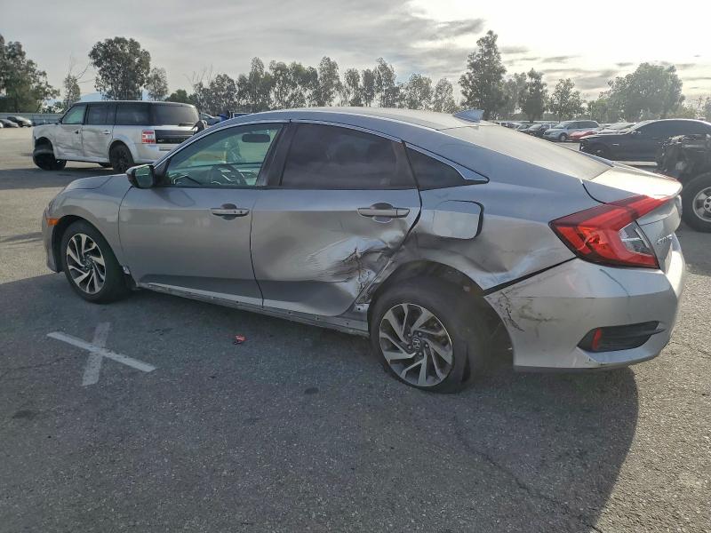 Photo 2 from auction – 2018 HONDA CIVIC EX with VIN 2HGFC2F77JH577883