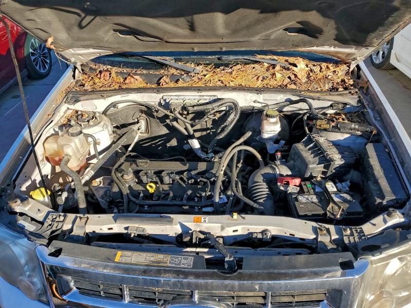 Photo 12 from auction – 2011 FORD ESCAPE LIM with VIN 1FMCU9E78BKC69314