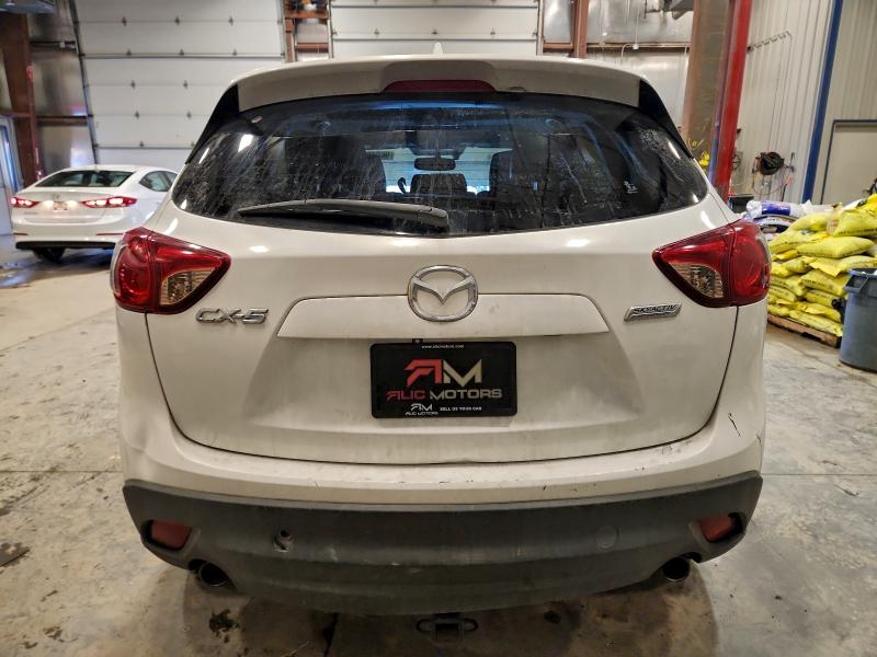 Photo 6 from auction – 2013 MAZDA CX-5 with VIN JM3KE2DE5D0146869