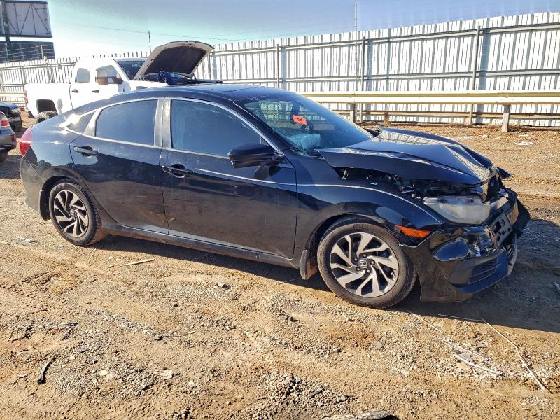 Photo 4 from auction – 2018 HONDA CIVIC EX with VIN 19XFC2F77JE001351