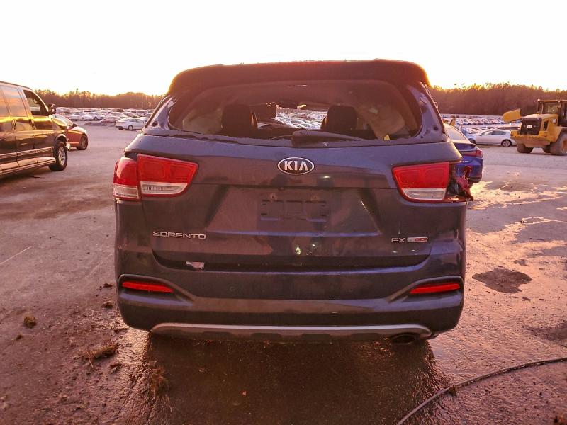 Photo 6 from auction – 2016 KIA SORENTO EX with VIN 5XYPH4A14GG009097