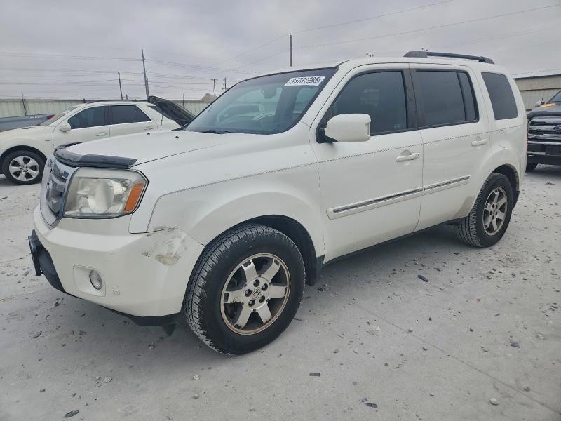 HONDA PILOT TOUR 2011 with VIN 5FNYF3H92BB041529 - Photo from auction