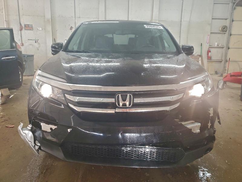 Photo 5 from auction – 2018 HONDA PILOT EXL with VIN 5FNYF5H5XJB025313