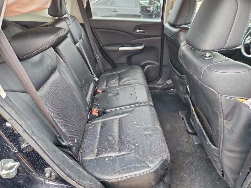 Photo 11 from auction – 2015 HONDA CR-V with VIN 2HKRM4H74FH623184