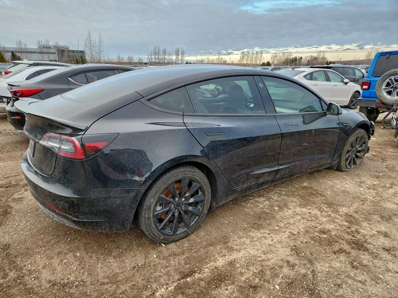 Photo 3 from auction – 2023 TESLA MODEL 3 with VIN 5YJ3E1EA4PF384852