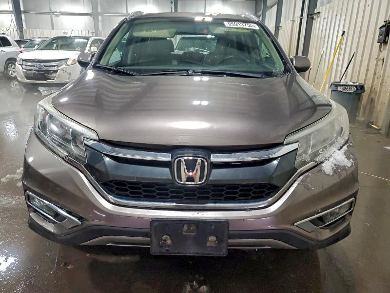 Photo 5 from auction – 2016 HONDA CR-V EXL with VIN 5J6RM4H75GL074652