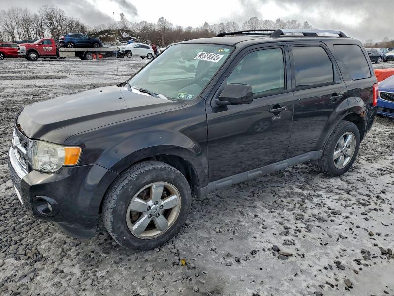 FORD ESCAPE LIM 2011 with VIN 1FMCU9E7XBKB10469 - Photo from auction