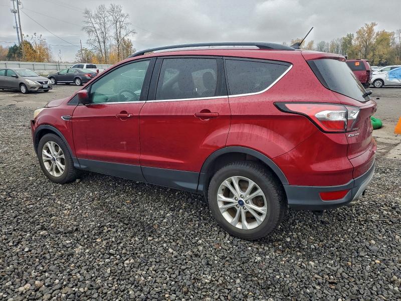 Photo 2 from auction – 2018 FORD ESCAPE SE with VIN 1FMCU9GD4JUA52056
