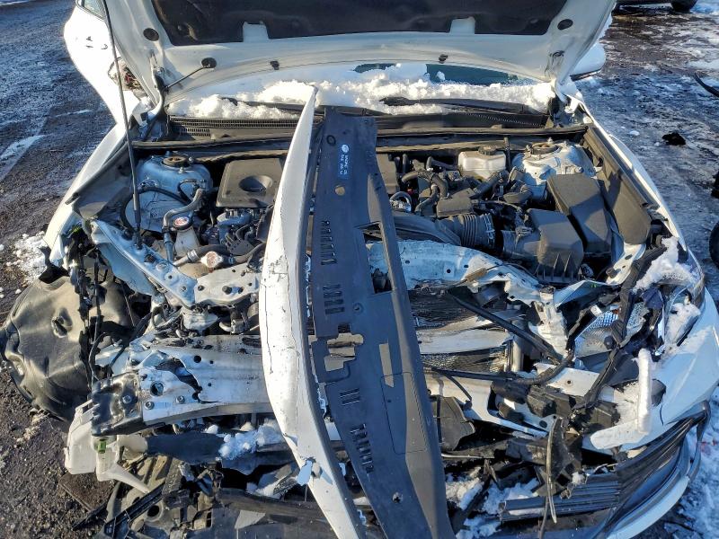 Photo 11 from auction – 2023 TOYOTA CAMRY LE with VIN 4T1C31AK6PU619954