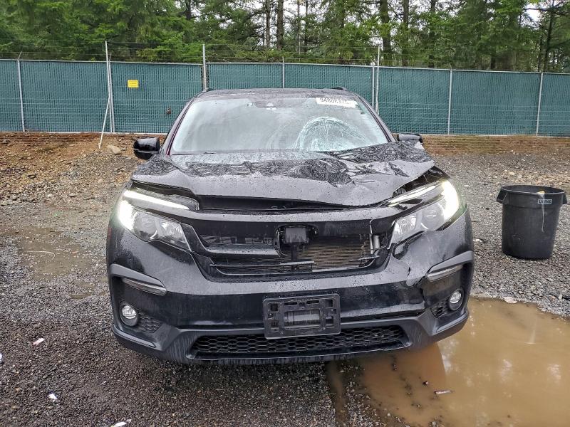 Photo 5 from auction – 2021 HONDA PILOT SE with VIN 5FNYF6H24MB057111