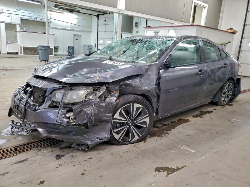HONDA CIVIC 2018 with VIN 2HGFC1F76JH640966 - Photo from auction