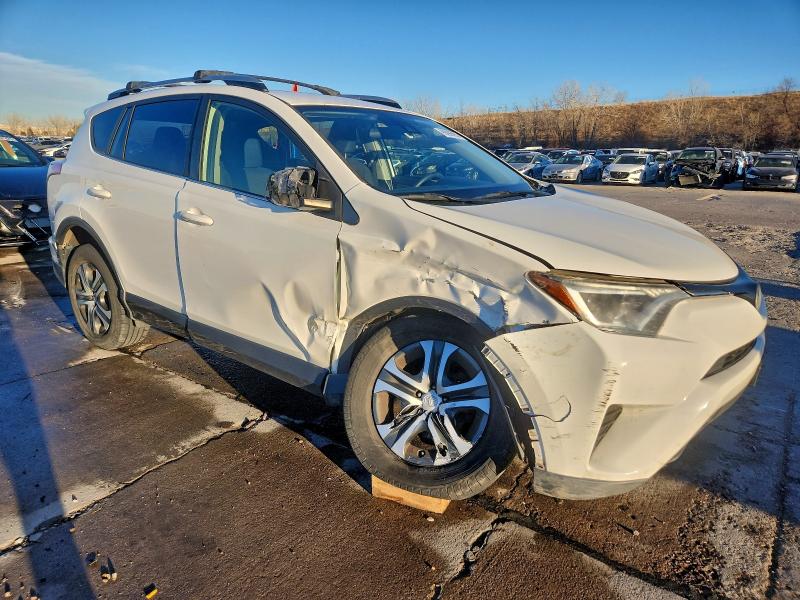 Photo 4 from auction – 2017 TOYOTA RAV4 LE with VIN JTMBFREV5HJ120270