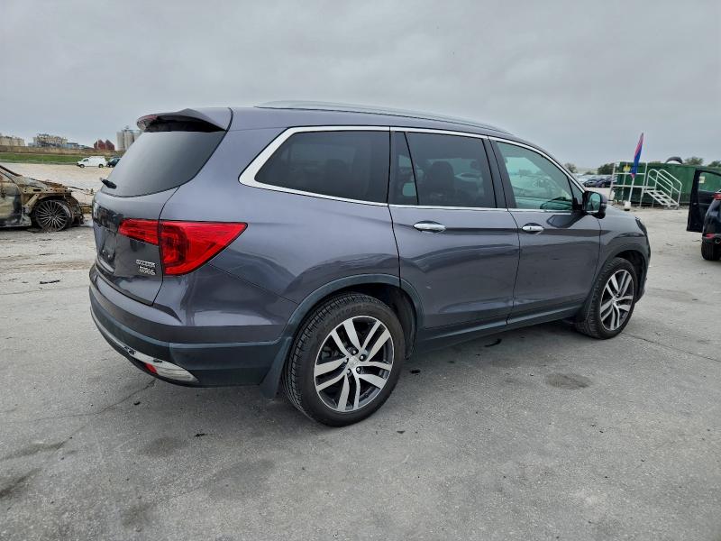 Photo 3 from auction – 2018 HONDA PILOT TOUR with VIN 5FNYF5H90JB030152