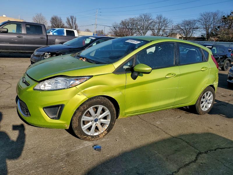 FORD FIESTA SE 2011 with VIN 3FADP4EJ5BM137513 - Photo from auction