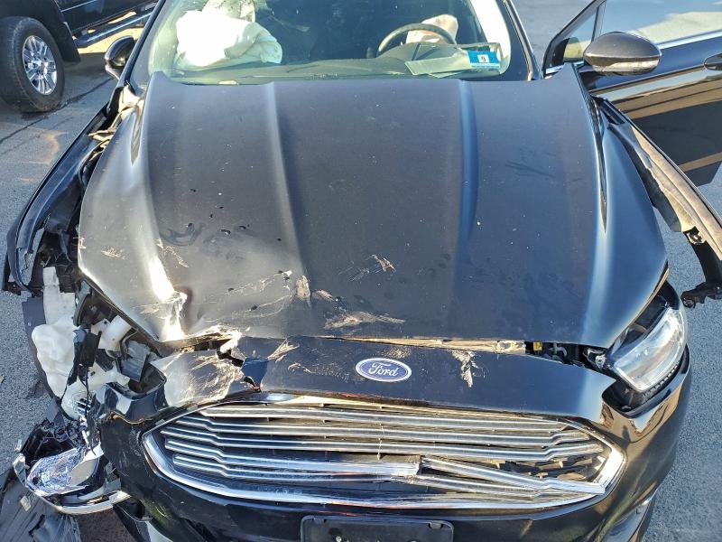 Photo 11 from auction – 2016 FORD FUSION SE with VIN 3FA6P0H77GR302120