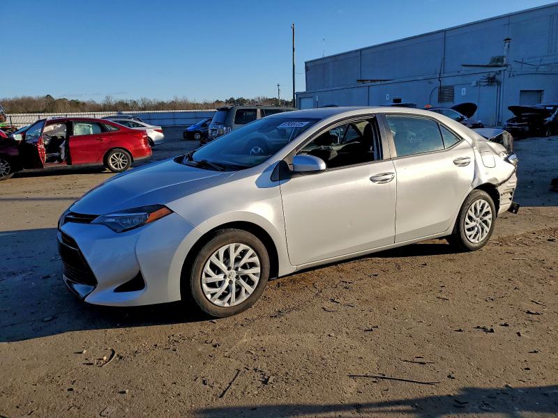 TOYOTA COROLLA L 2019 with VIN 5YFBURHEXKP864032 - Photo from auction